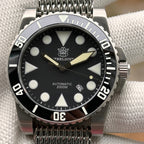 Steeldive SD1987 black dial macro showing applied indices, BGW9 lume hands and date