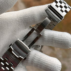 Steeldive SD1987 jubilee bracelet with signed clasp and end-link detail in hand