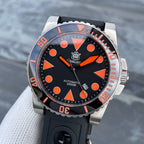 Steeldive SD1987 orange-accented diver on black perforated rubber strap, front three-quarter view
