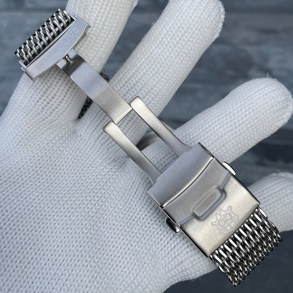 Steeldive SD1987 shark-mesh bracelet clasp shown open with Steeldive engraving and safety latch
