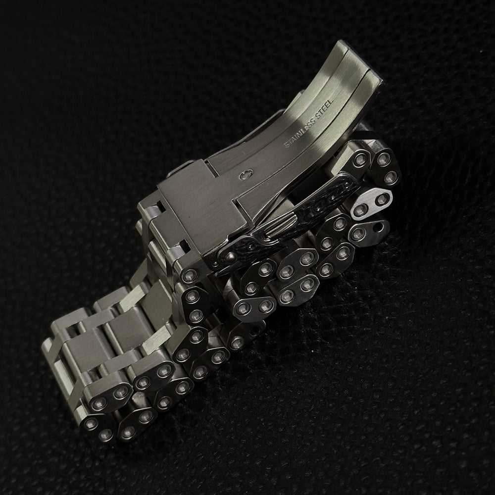 Steeldive SD1987 folded diver clasp showing extension links and stainless steel engraving
