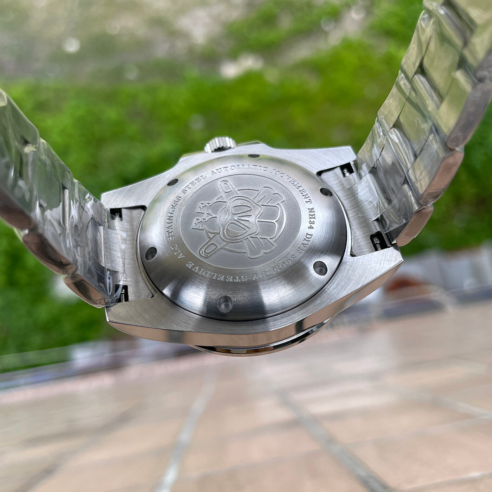 Steeldive SD1992 GMT dive watch caseback engraved with diver logo and NH34 300m markings