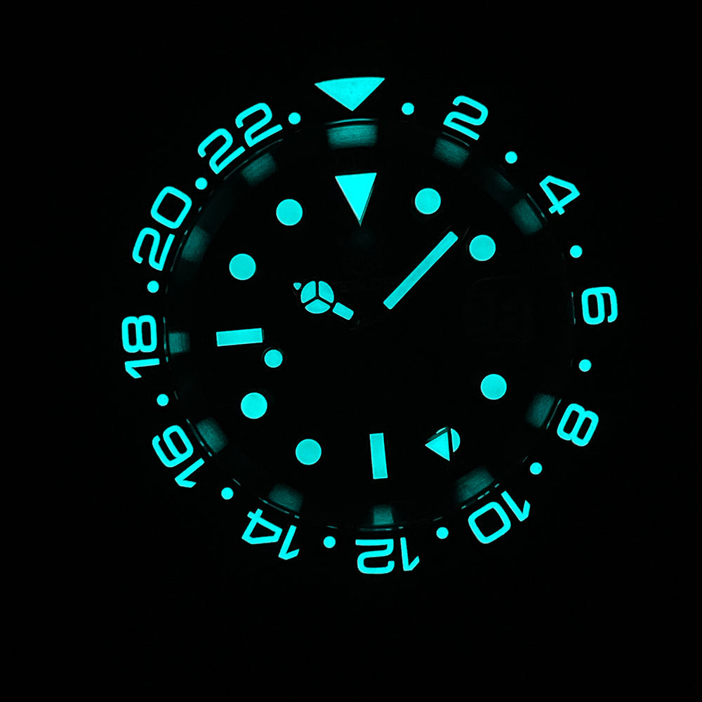 Steeldive SD1993 GMT watch sd1993-black dial glowing blue C3 lume on indices, bezel and hands, dark lume shot