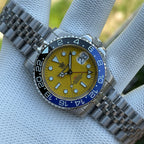 Steeldive SD1993 GMT watch with yellow dial and blue-black Batman bezel, jubilee bracelet front view