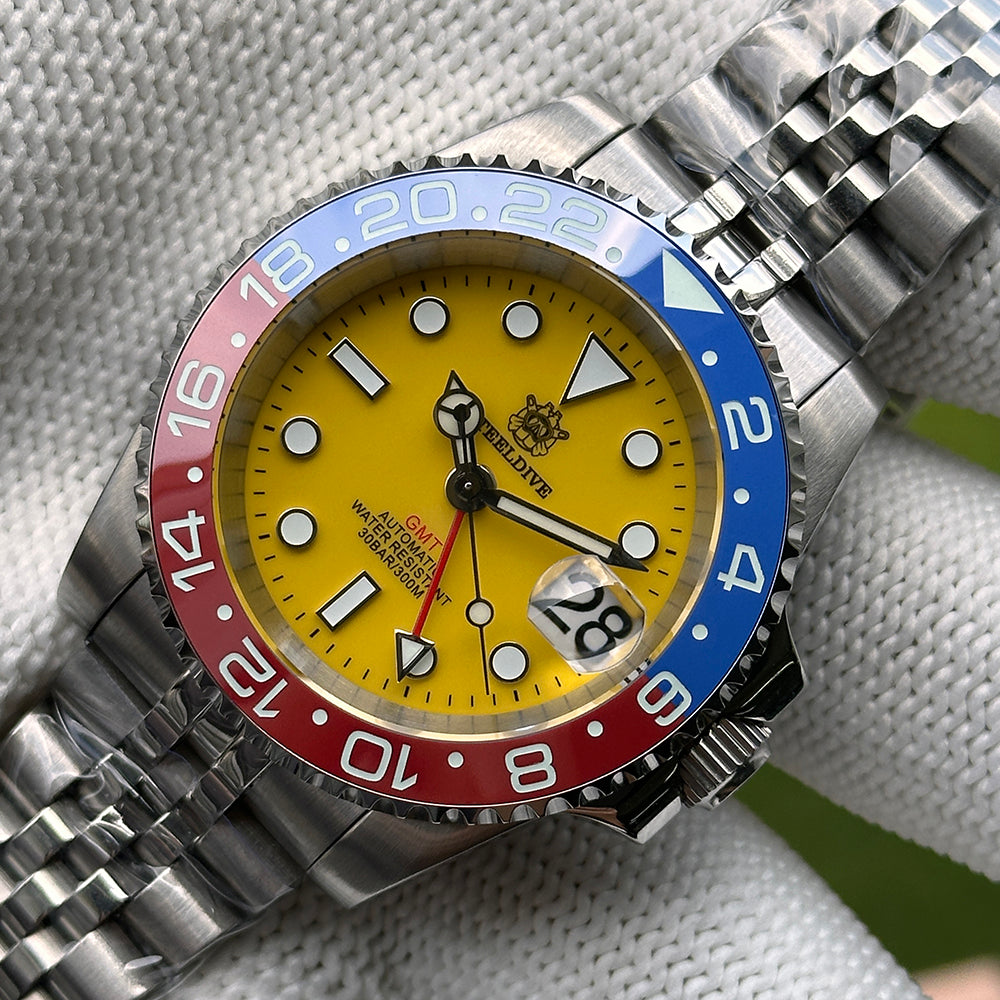 Steeldive SD1993 yellow dial macro shot with Pepsi blue-red GMT bezel and applied indices