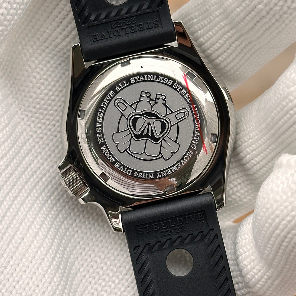 Steeldive SD1994 stainless steel caseback engraved with diver helmet and NH34 200M text