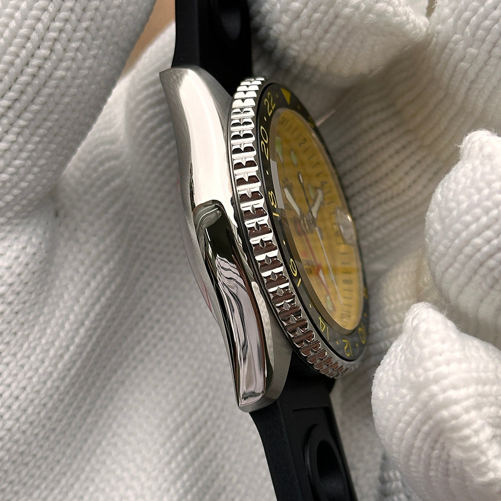 Steeldive SD1994 crown and case side detail with yellow dial peeking from black ceramic bezel