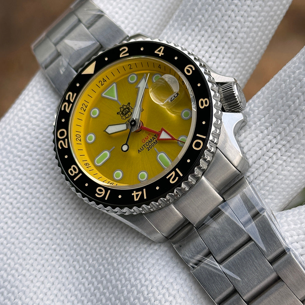 Steeldive SD1994 yellow dial GMT on oyster bracelet shown at 3/4 angled view