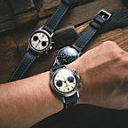 Sugess 1963 V3 men's chronograph panda watch comparison showing three dial variants on wood surface