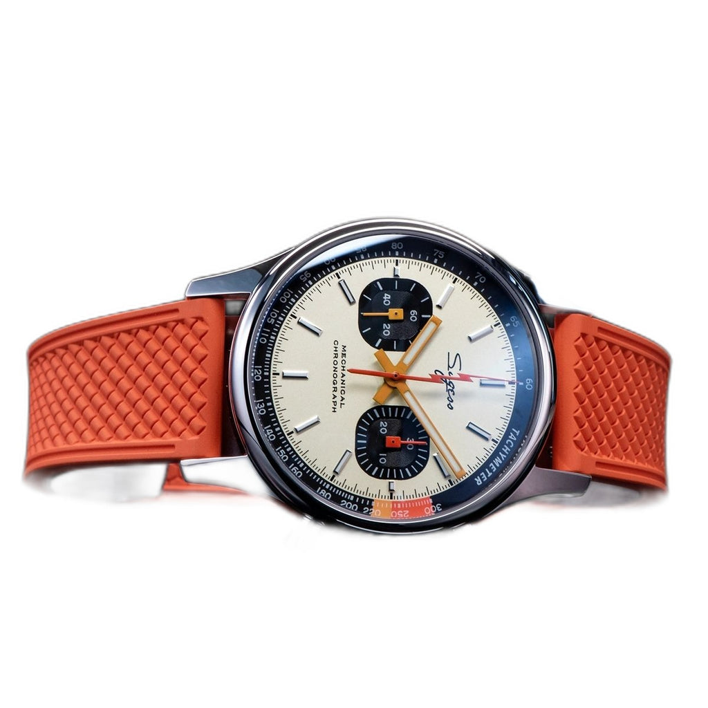 Sugess 387F cream panda chronograph on orange rubber strap, dramatic angled reflection view