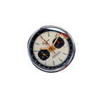 Sugess 387F cream panda chronograph on orange rubber strap, angled view with reflection