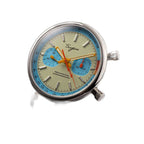 Sugess 387F teal-blue panda chronograph on brown leather strap, three-quarter angled view