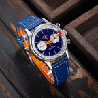 Sugess S365 chronograph pilot watch with blue dial and blue leather strap on wooden surface