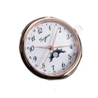 Sugess S395-02 white-dial rose-gold moonphase on brown leather strap, angled flat-lay on black fabric