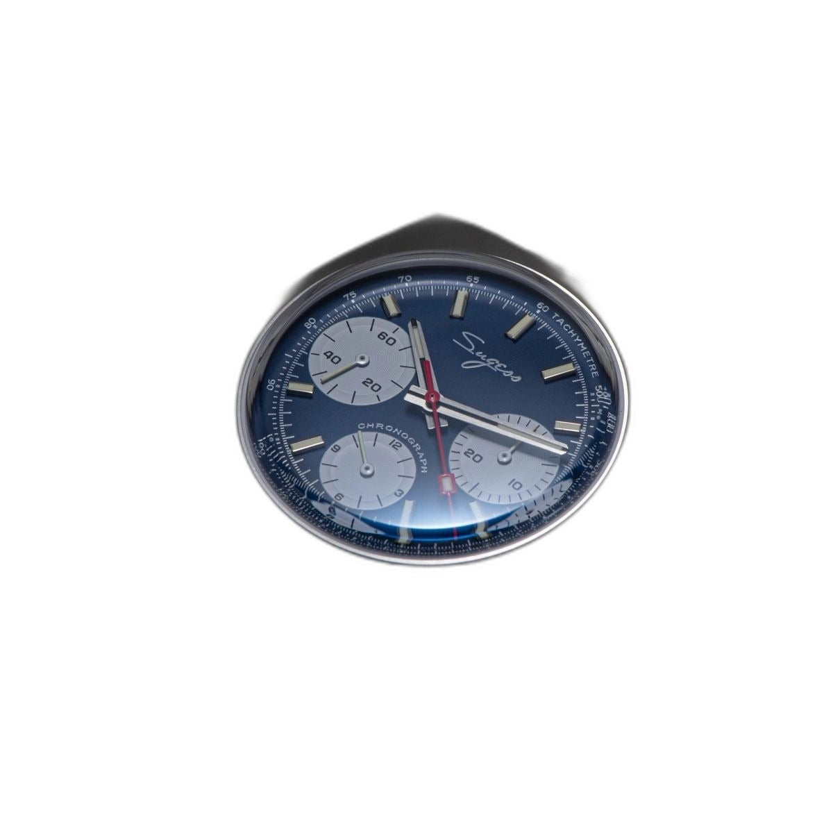 Sugess S419 blue dial with white sub-dials on steel bracelet, three-quarter angled view on blue tray
