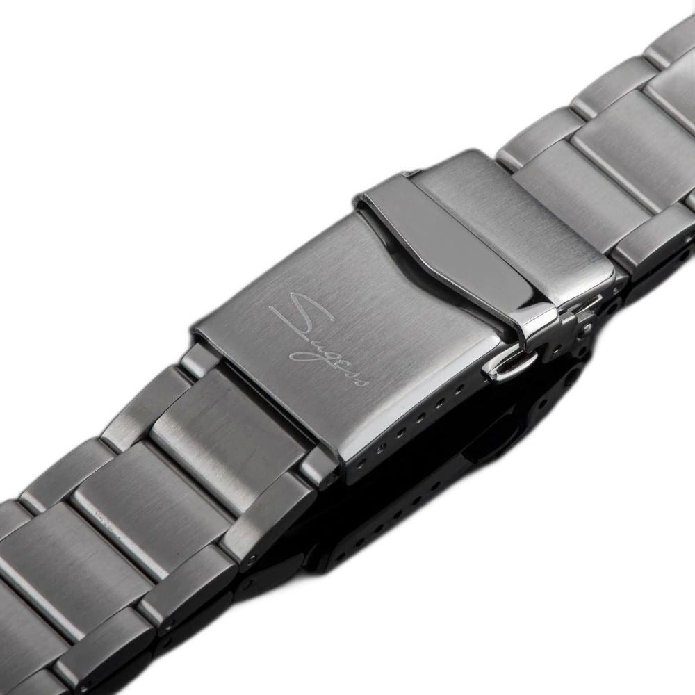 Sugess S419 steel bracelet with Sugess engraved folding clasp, brushed links, close-up on dark