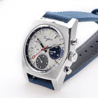 Sugess S419 special panda silver dial with navy and black sub-dials, blue canvas strap, three-quarter angled view
