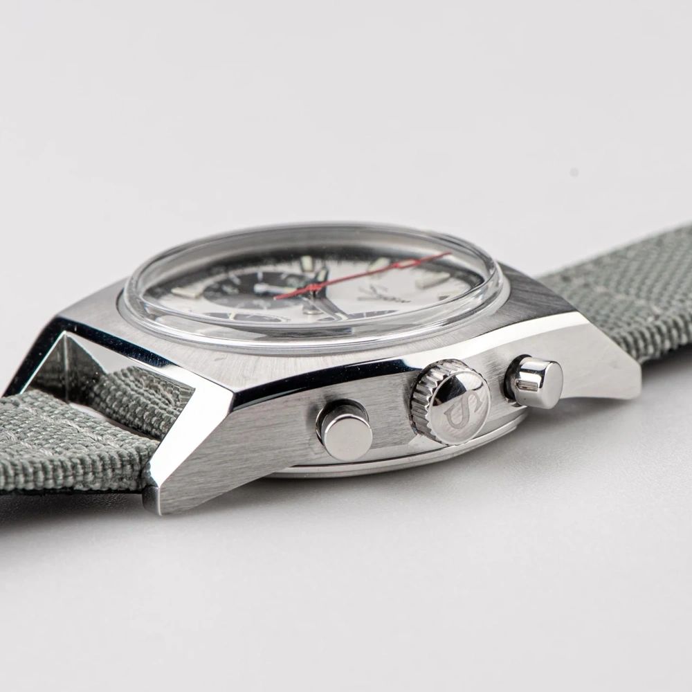 Sugess S419 white panda dial, black sub-dials, grey canvas strap, three-quarter angled view