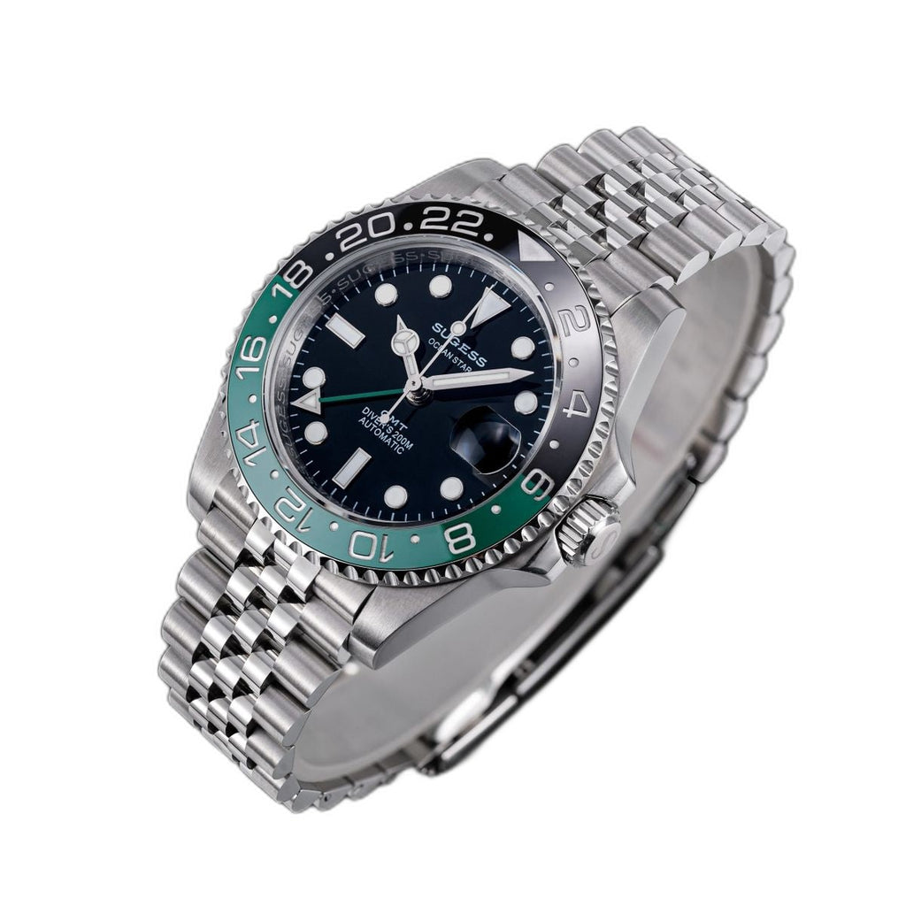 Sugess S420-2 Sprite GMT diver, green and black bezel, black dial, jubilee bracelet, three-quarter angled view
