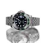 Sugess S420-2 Sprite GMT diver, green and black bezel, black dial, jubilee bracelet, front view reflected on black