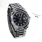 Sugess S433 black-dial day-date with baguette markers, fluted bezel, president bracelet, angled studio view