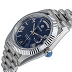 Sugess S433 blue dial day-date, fluted bezel, steel president bracelet, angled view with blue S crown