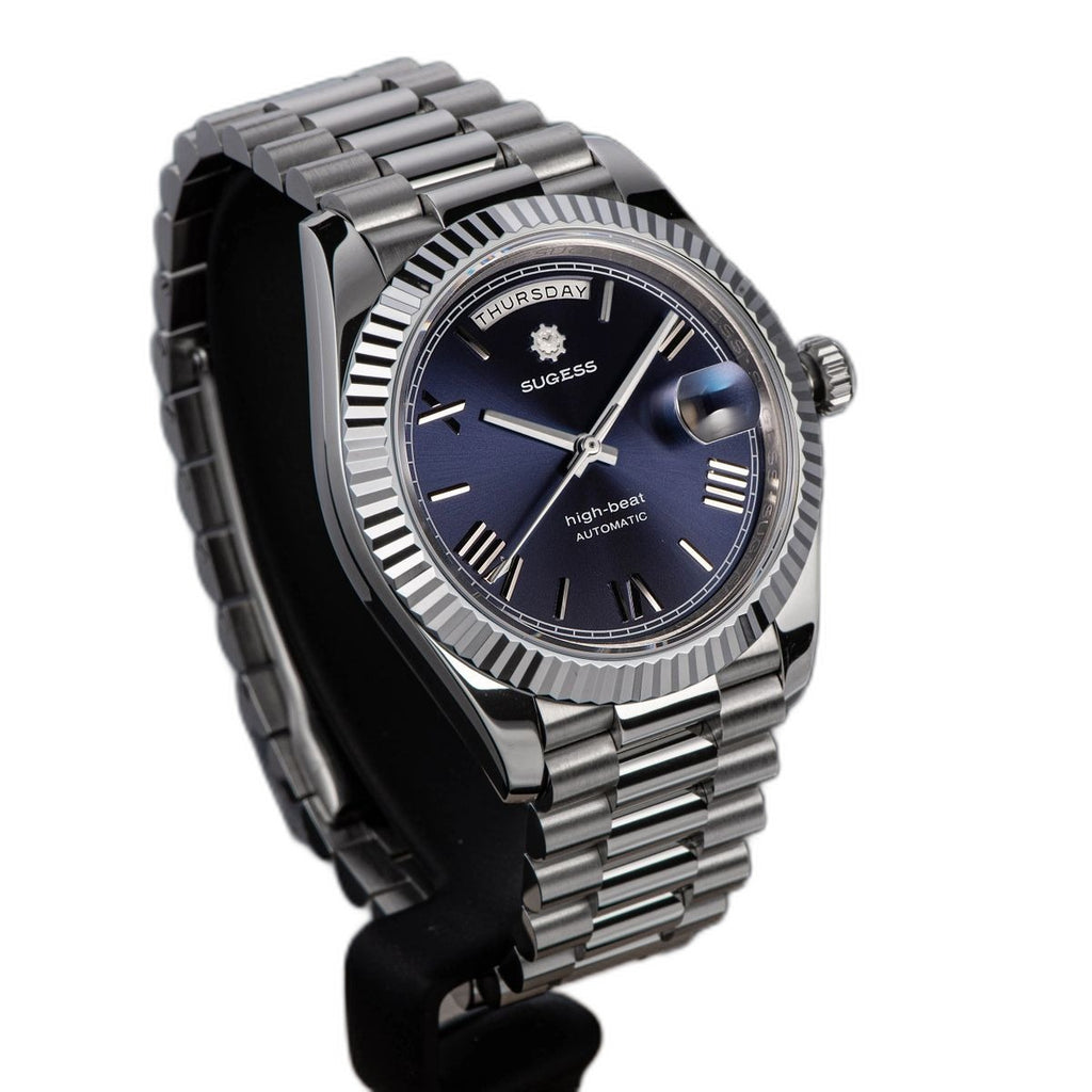 Sugess S433 blue dial day-date, fluted bezel, steel president bracelet, angled studio product view