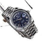 Sugess S433 blue dial day-date, fluted bezel, steel president bracelet, three-quarter angled view