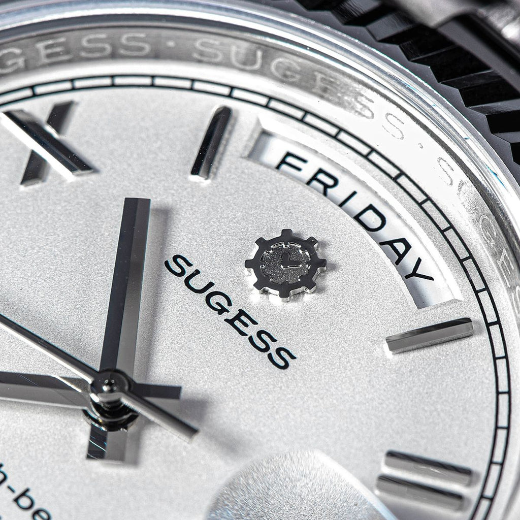 Sugess S433 white silver dial macro, Friday day window, Sugess gear logo and Roman numerals, close-up