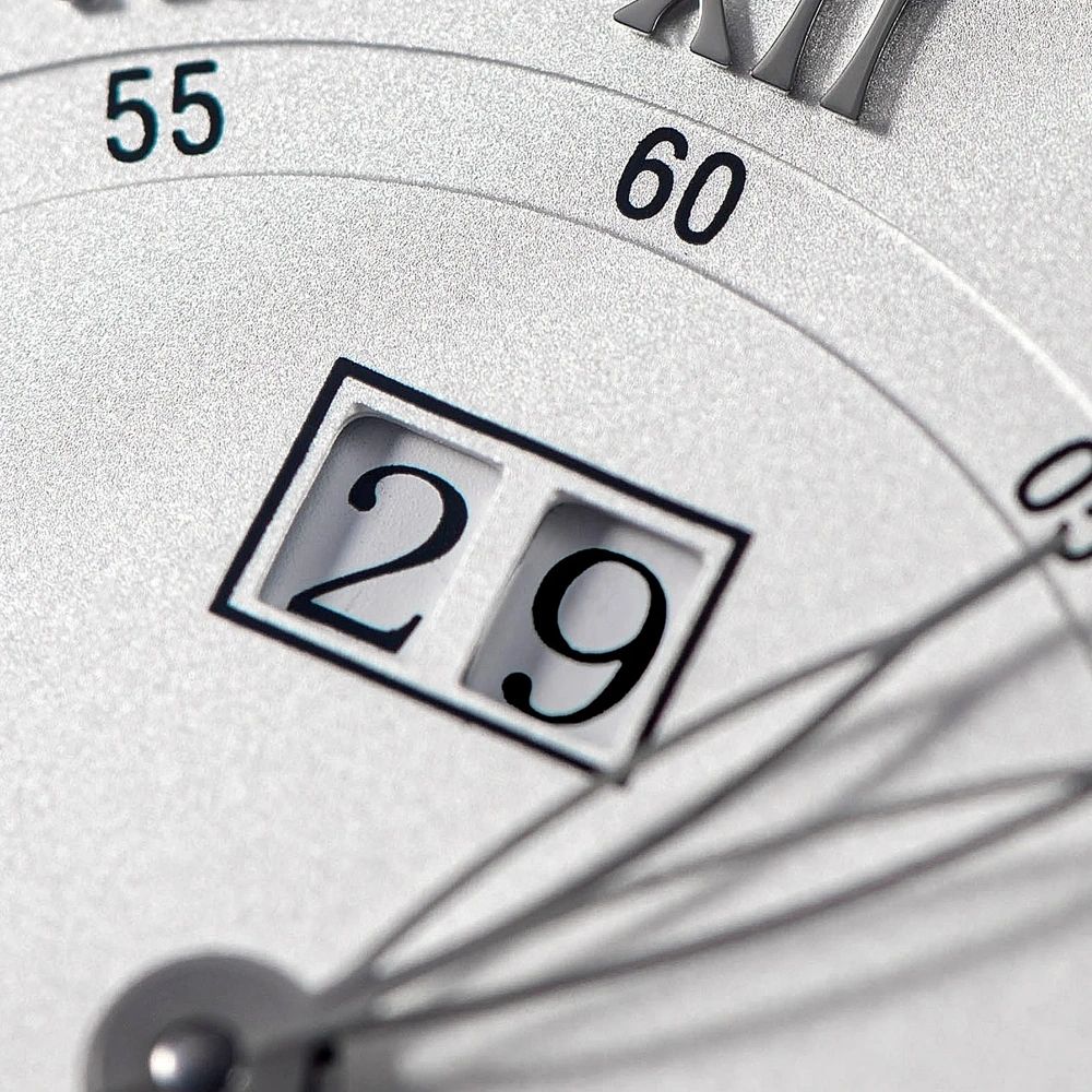 Sugess S437-05 dial big date window macro, framed date aperture and minute track, close-up