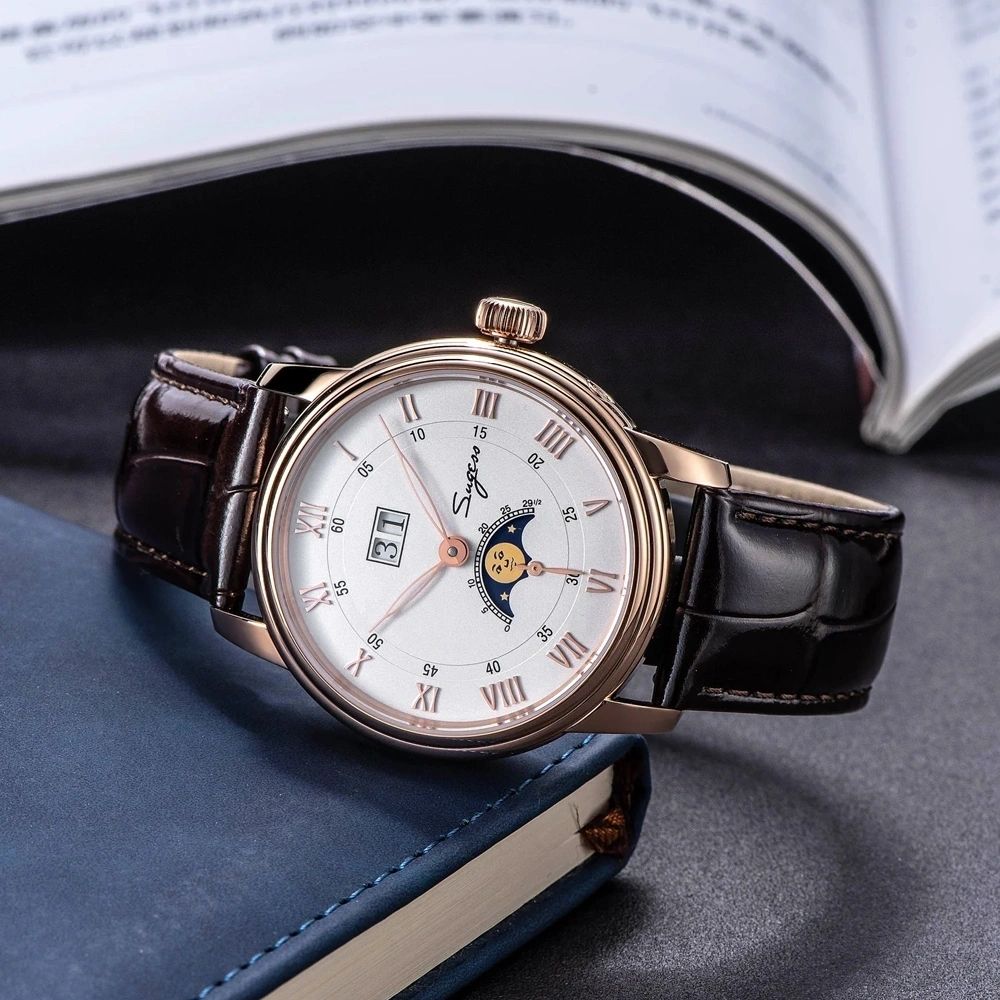 Sugess S437 silver dial moonphase, rose gold case, brown leather strap, dramatic angled studio view