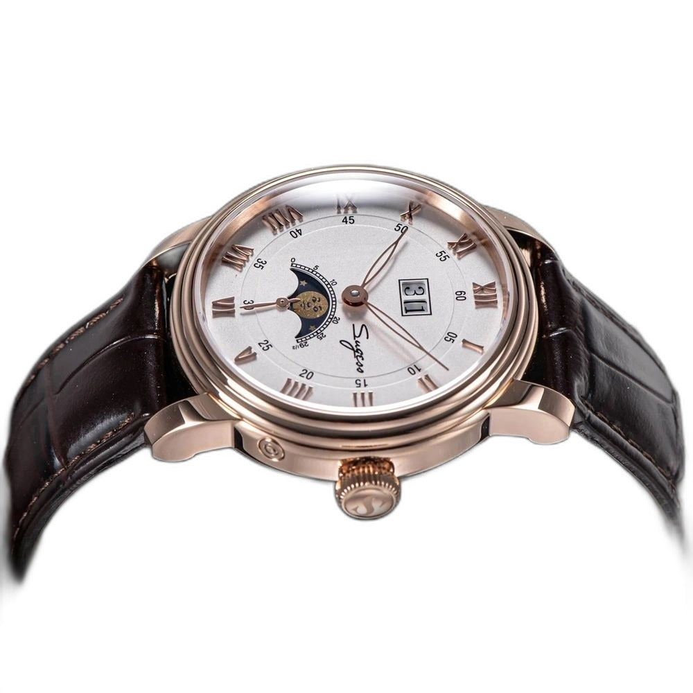 Sugess S437 silver dial moonphase, rose gold case, brown leather strap, angled view resting on print