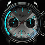 Sugess S438 silver panda chronograph, black sub-dials, racing strap, dramatic angled view on dark