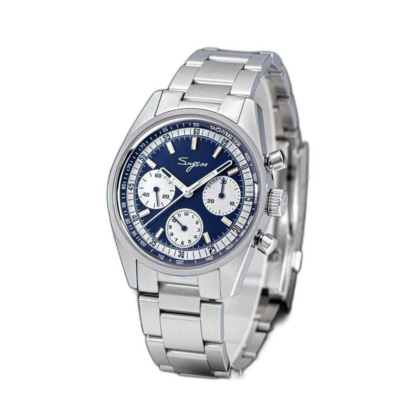 Sugess S442 blue panda chronograph, white sub-dials, steel bracelet, dramatic angled view on dark surface
