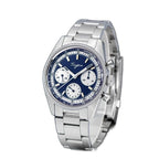 Sugess S442 blue panda chronograph, white sub-dials, steel bracelet, dramatic angled view on dark surface