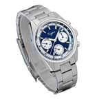 Sugess S442 blue panda chronograph, white sub-dials, steel bracelet, close angled view on dark background