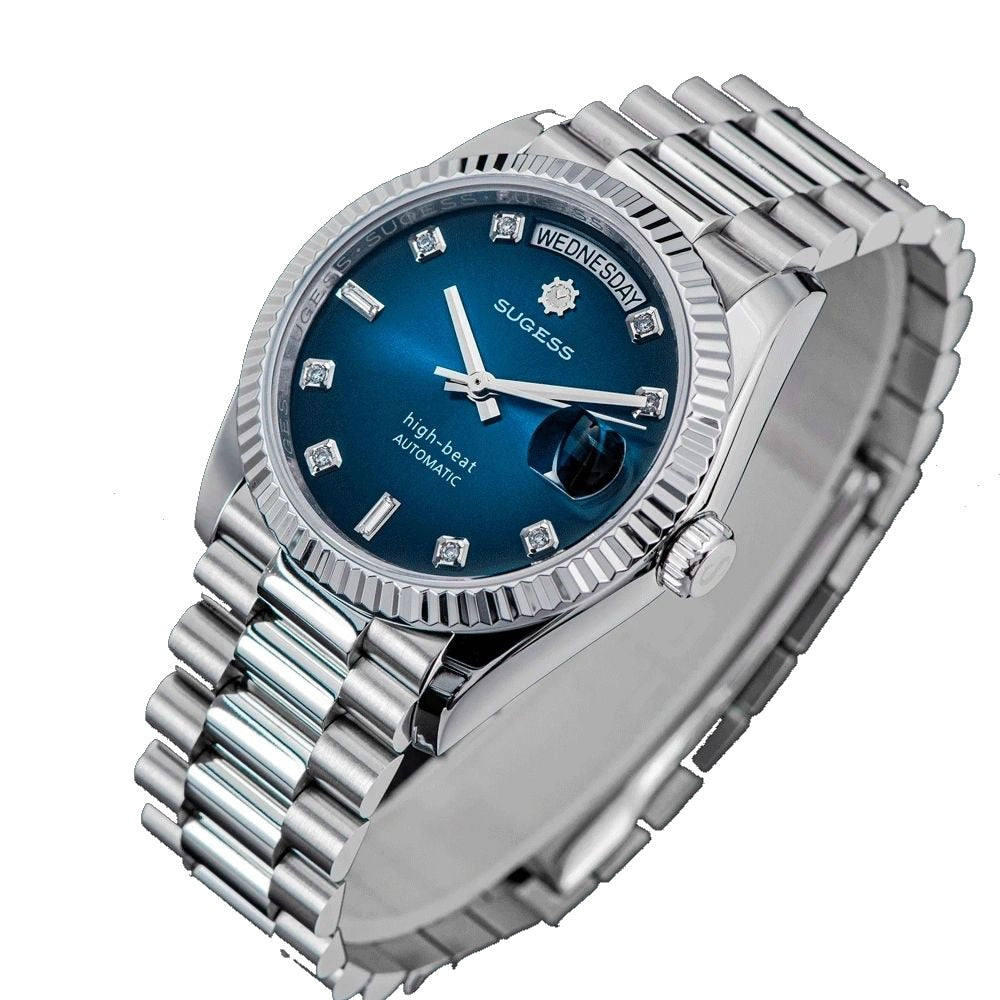 Sugess S449 blue dial day-date, fluted steel bezel, diamond markers, three-quarter angle on dark surface