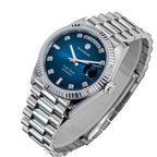 Sugess S449 blue dial day-date, fluted steel bezel, diamond markers, three-quarter angle on dark surface