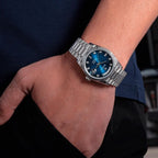 Sugess S449 blue dial day-date on the wrist, steel president bracelet, diamond markers, hand in pocket, Wednesday
