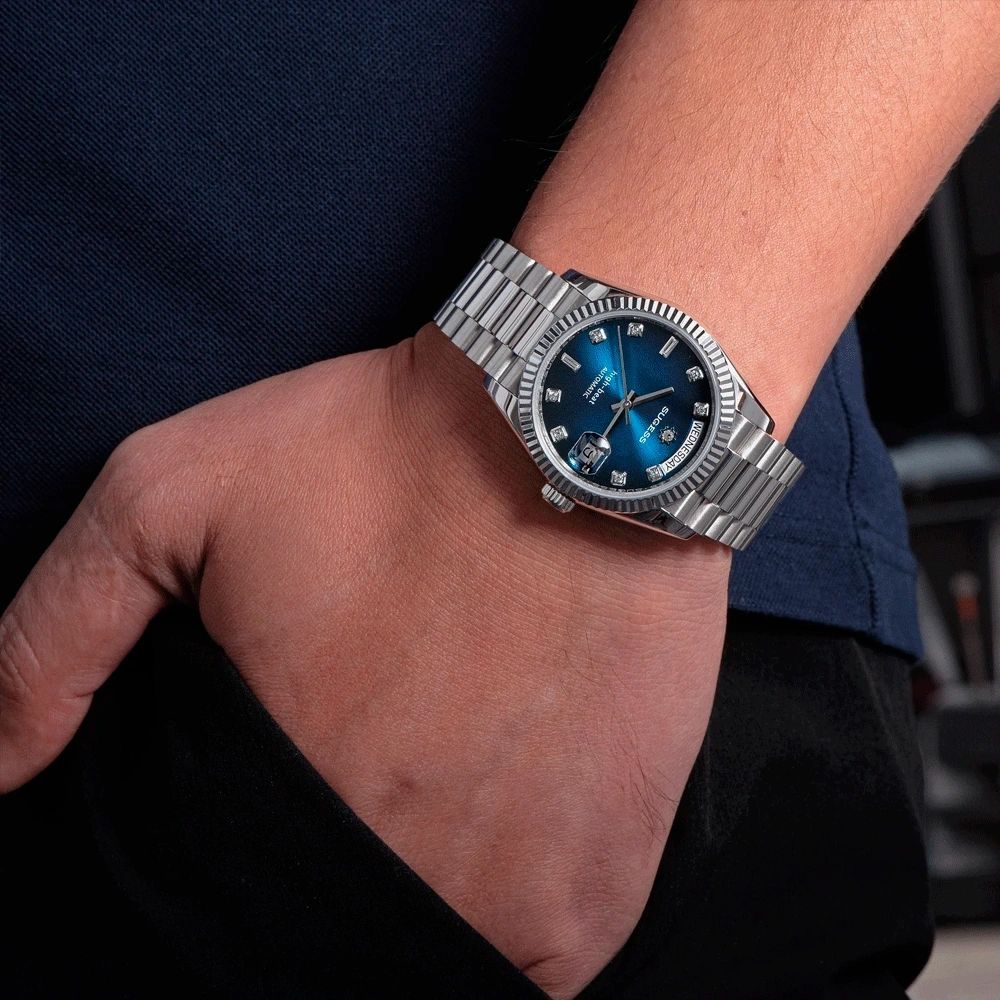 Sugess S449 blue dial day-date on the wrist, steel president bracelet, diamond markers, hand in pocket, Wednesday