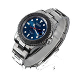 Sugess S450 blue dial dive watch, black bezel, red seconds hand, steel bracelet, dramatic angled studio view