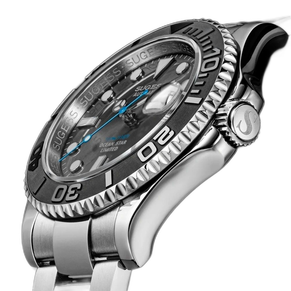 Sugess S450 grey dial dive watch, black bezel, blue seconds, S-engraved crown, three-quarter angled view on black