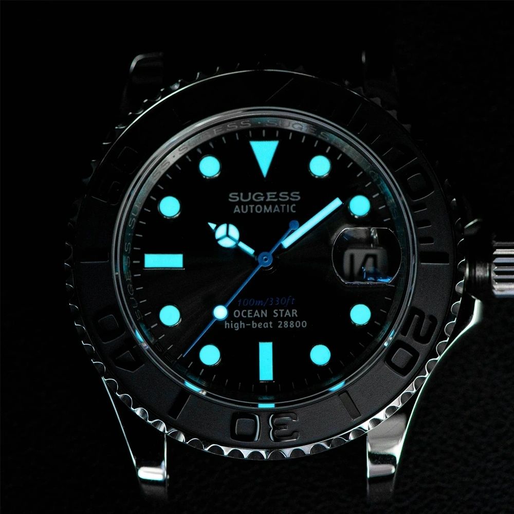 Sugess S450 Ocean Star dive watch dial and bezel glowing blue lume in the dark, high-beat 28800, close-up