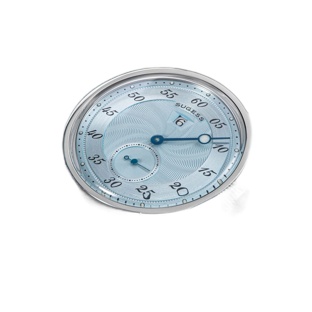 Sugess S451 ice blue guilloche regulator dress watch, grey suede strap, angled studio view on navy