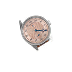 Sugess S451 salmon guilloche regulator dress watch, black leather strap, angled view resting on a blue box