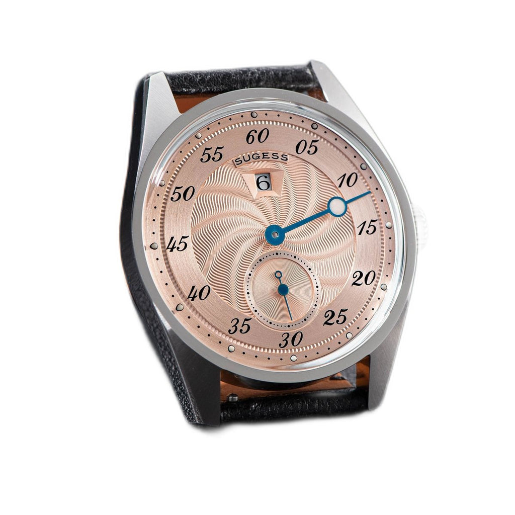 Sugess S451 salmon guilloche regulator dress watch, black leather strap, three-quarter angled view on grey