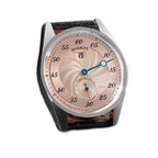 Sugess S451 salmon guilloche regulator dress watch, black leather strap, three-quarter angled view on grey