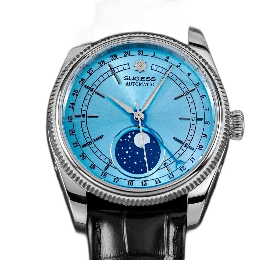 Sugess S452 steel moonphase watch, ice blue dial, black leather strap, angled view on blue leather