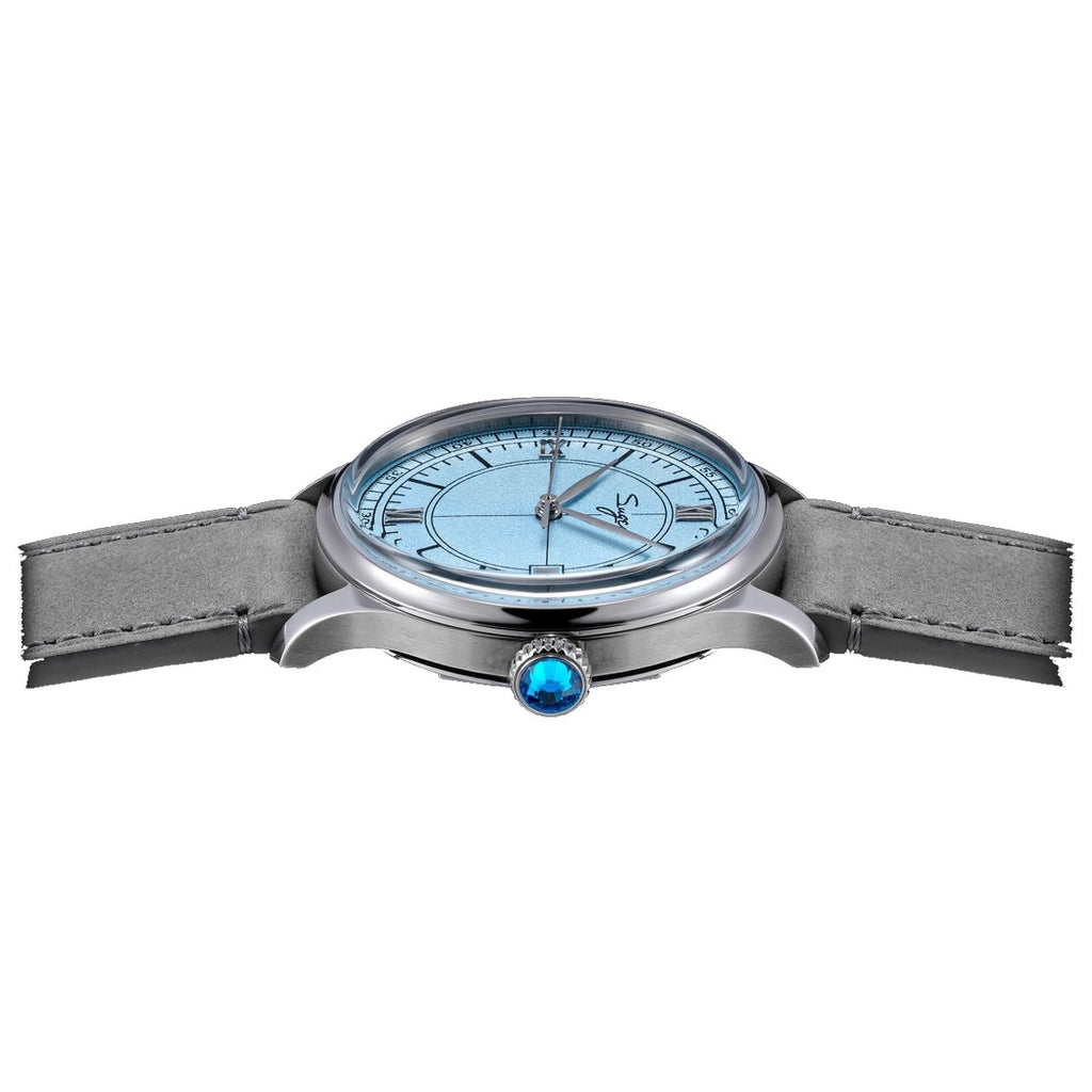 Sugess S455 Art Master ice blue dial dress watch side profile, blue gem crown, grey suede strap, on black