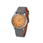Sugess S455 Art Master salmon frosted dial dress watch, grey suede strap, three-quarter angled view on black
